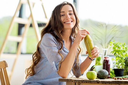 The girl who is drinking green smoothies for weight loss
